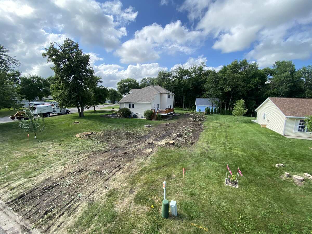 Same tree line cleared to open ground